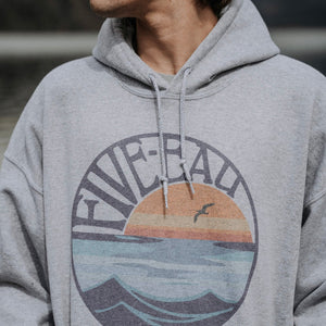 Retro sunset design on a grey hoodie.